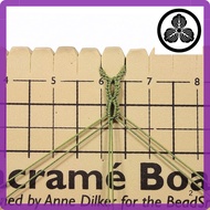 Beadsmith macrame board, 11.5 x 39.4 cm, 0.5-inch thick foam, with a measurement grid of 25.4 x 35.6