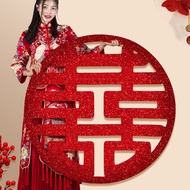 Round red happy letters in traditional brocade fabric to decorate weddings, floats, and wedding room