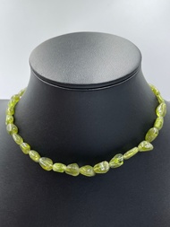 Natural peridot freeform nugget shape. เพอริดอทฟรีฟอร์มรูปทรงนักเก็ตธรรมชาติ