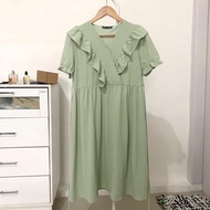 Sage green ruffle dress by DAZY