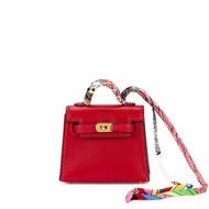 Hermès Rubis Tadelakt Micro Mini Kelly Twilly Bag Charm Gold Hardware, 2022