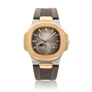 Patek Philippe Patek Philippe Nautilus (Reference 5712GR-001). A pink gold and stainless steel autom