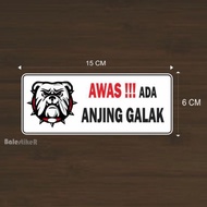 Awas sticker has a fierce dog