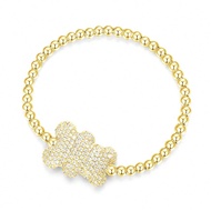 Vòng tay hạt cườm gấu bông vàng APM Monaco YB5324OX