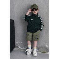 HIJAU Children's sports Tracktop jacket by Ad*das bottle green for ages 6-8 years