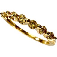 Pre-owned 18K gold ring with a natural yellow diamond (0.30ct) and 2.4g. Size 14.