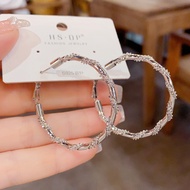 2026 New Style Fashionable Exaggerated Metal Broken Silver Winding Earrings Female Light Luxury Simp