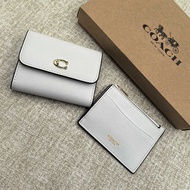 Coach Ladies Short Card Wallet with Brown Leather and Patterned Design Gold Logo Two Card Slots Offi