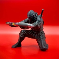 CM56 0.00 A pen holder in the shape of a ninja warrior, perfect for adding a touch of style to your 