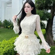 Luxurious lady's dress, luxuriously designed dress, off-the-shoulder dress with long sleeves and pre