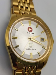 นาฬิกา ราโด้ รุ่นม้าทอง ระบบออโตเมติก หน้าปัดสีขาวสายเลสสีทอง  gold dial diamond 40 mm men’s Watch ร