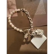 Rhinestone and pearl phone charm, short wrist lanyard, fashionable high-end women’s Chanel-style tag