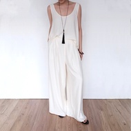 OMAI wide-leg pants designed with wrinkled silk and back zip - BQ16