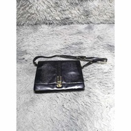 Black leather Turn Lock Baguette Bag