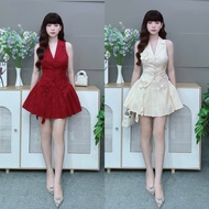 C76 vest and pleated skirt