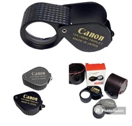 กล้องส่องพระ Canon 10x18mm เลนส์ 3ชั้น 10x สินค้ามีสีดำพร้อมซองหนัง