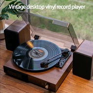 Vintage desktop vinyl record player, gramophone with split speaker, LP audiophile, record player