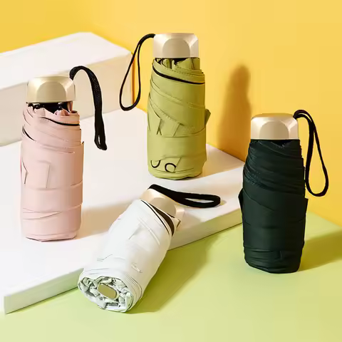 Mini Sunumbrella pocket Umbrella Vinyl folding UV protection sunshade pocket umbrella Capsule umbrel