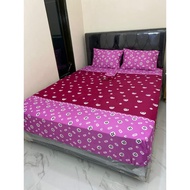 Fuchsia pink jumputan bed sheet