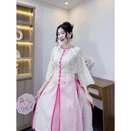 (Available in big size waist under 84cm) Silk ao dai embroidered with slits in cream color, pink pan