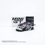 Mini GT 1143 Porsche 911 GT3 R 77 AO Racing 2025 IMSA Petit skeleton rexy Racing