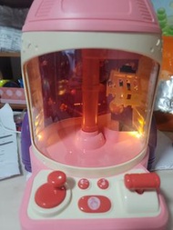 Toy claw machine (Battery charged or line charged, line included and toys included)