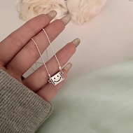 Baby smiley face necklace