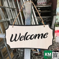 Wooden wall-mounted welcome board used to decorate shops, shops, restaurants