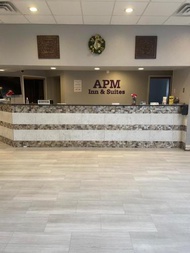 Apm Inn & Suites