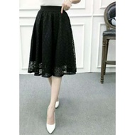 Fashionable floral lace skirt above the knee