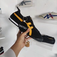 Onitsuka slip on black yellow sneakers