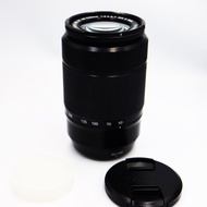 Fujifilm Fuji Fujinon XC 50-230mm F4.5-6.7 OIS II  ซึ่งใช้ชิ้นเลนส์ทั้งหมด 13 ชิ้นใน 10 กลุ่มรวมถึงช