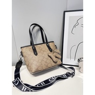 New Women's COA High Quality Handbag Fashion Versatile Single Shoulder Bag with Hanging Accessories Crossbody Bag