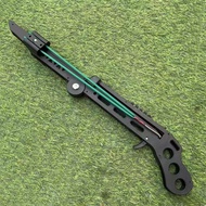 Black toy gun with scope and cutout handle.