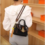 Women's handbag KT23cm crossbody bag made in Guangzhou and exported to Europe with wheel lock