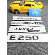 Braille letter E250 is pasted on the back of Mercedes-Benz E250