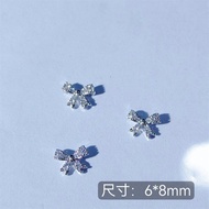 Set of 2 nail charms with bow nails A2