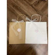 Be Dieu logo paper bag with lace tie as a gift paper bag gift bag goodies bag