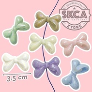 CZY2 Mote Ribbon Bowtie Pastel AB Hole