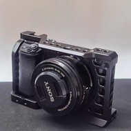 เหมาะสำหรับ Sony A6400กรงกระต่ายบอร์ดแบบปลดออกได้อย่างรวดเร็ว A6000/A6300/A6500/A6100กล้องกรงกระต่าย