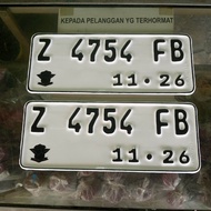 Plat nomor motor berlogo FONT BARU standard samsat 1pasang depan dan belakang