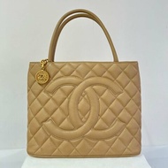 CHANEL米色荔枝金幣包