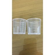 Set of 02 measuring cups 5ml to 30ml