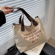 กระเป๋าผู้หญิง 2023 แฟชั่นใหม่ Commuter Bag กระเป๋าสะพายไหล่ผู้หญิงจดหมายอเนกประสงค์ Crossbody Cloth Bag