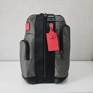 Tumi Tas Sling Higgins - Grey Tag Red