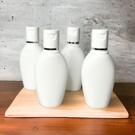 60ml Oval Shape HDPE White Bottle With Flip Cap Silver Line
