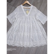 A cape to wear over a bikini or a dress inside