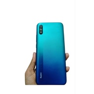 Secondhand androidd phone & new sealed earbud realmee t2OO