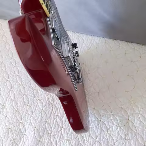 HOT!High-quality red electric guitar,a fingerboard with lightning inlays,in stock,fast shipping