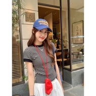 Super flattering and stretchy body-hugging women's shirt, tight striped women's shirt available.